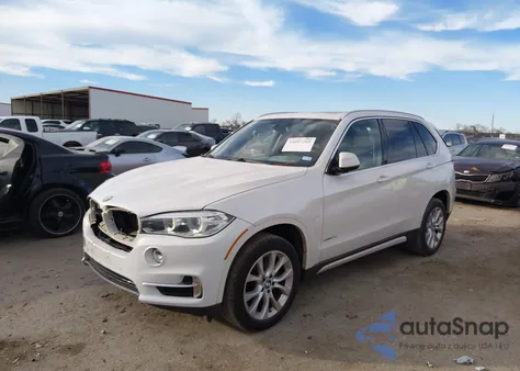 2014 BMW X5 Sdrive35I z USA, uszkodzony, nr VIN 5UXKR2C55E0C00690